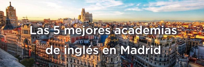 Fotografía de la calle donde impartimos nuestros cursos de inglés, Gran Vía 50, en pleno dentro de Madrid, y sobre ella el texto «Las 5 mejores academias de inglés en Madrid»
